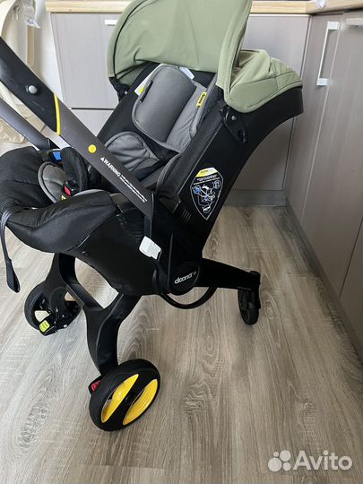 Коляска автокресло doona с базой isofix