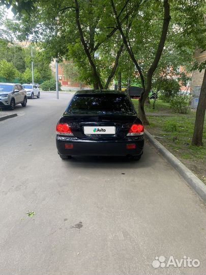 Mitsubishi Lancer 1.6 МТ, 2009, 172 450 км