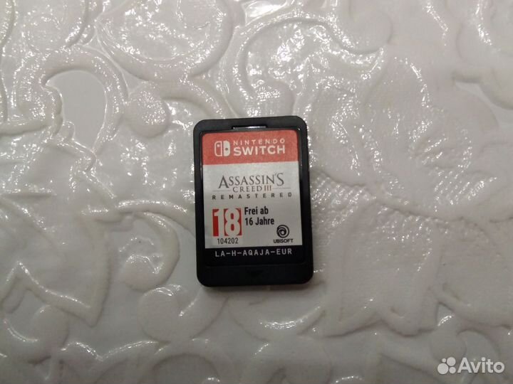 Картридж с игрой Assassin's Creed 3 Remastered