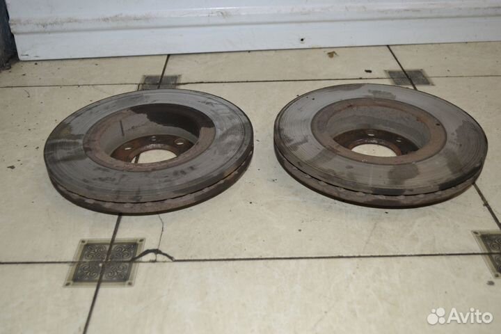 Тормозной диск передний Nissan Almera G15