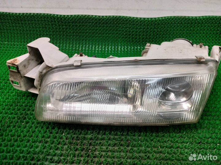 Фара передняя левая Mazda 626 GE FS 1995