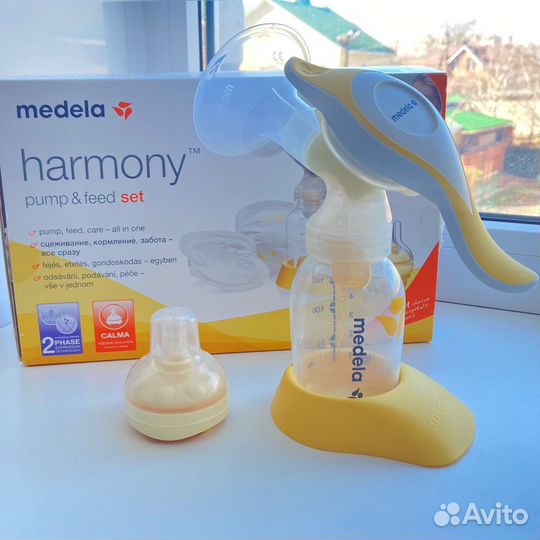 Молокоотсос medela ручной + смартсоска calma