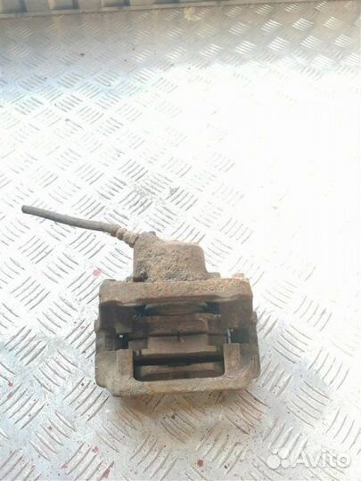 Суппорт тормозной передний левый Renault Logan