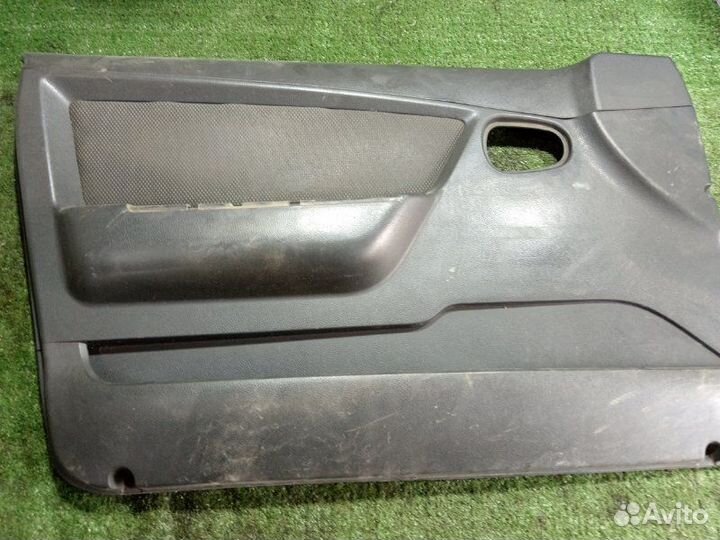 Обшивка боковой двери передняя левая Daewoo Nexia