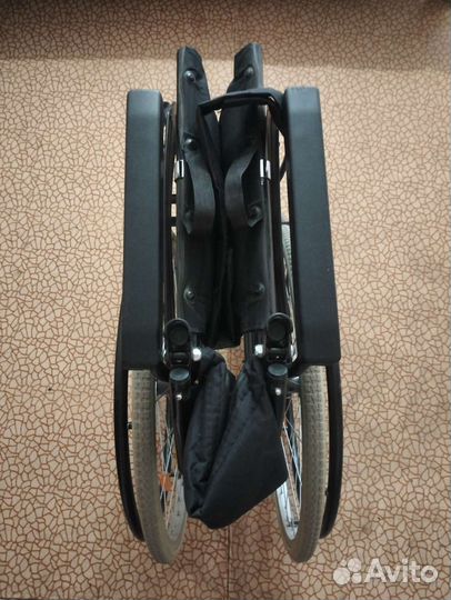 Инвалидная коляска