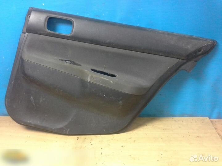 Обшивка двери задней правой Mitsubishi Lancer (CS