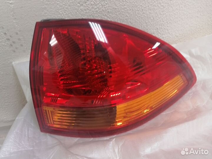 Фонарь задний левый mitsubishi pajero sport2 ориги