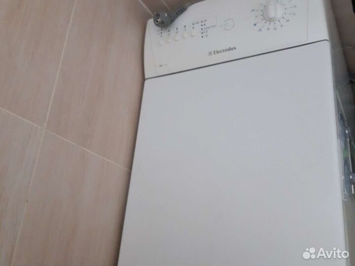 Стиральная машина с вертикальной загрузкой