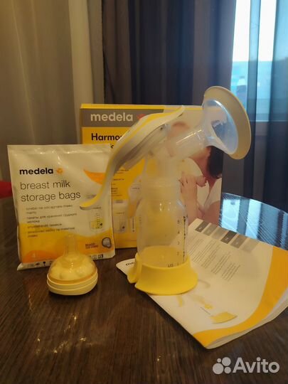 Молокоотсос medela ручной +calma+пакеты