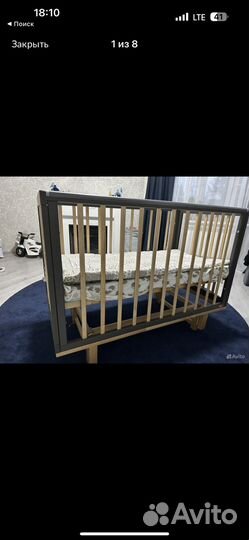 Детская кроватка с маятником