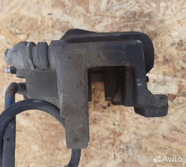 Суппорт тормозной передний левый Mazda CX-5 KE