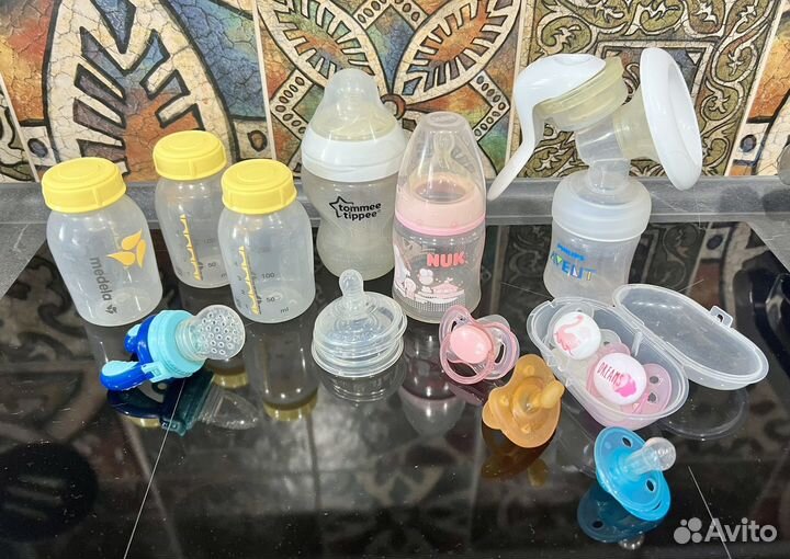 Молокоотсос, бутылочки, новые соски