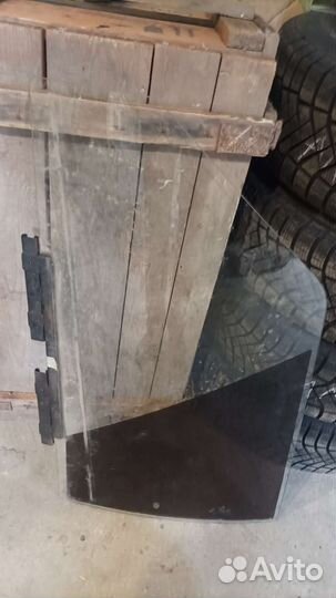 Стекло двери таврия