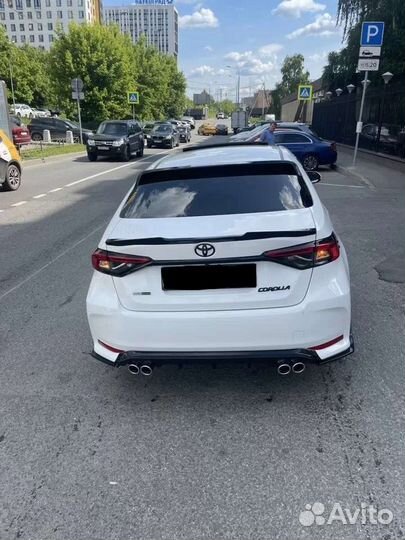 Toyota corolla Е210 спойлер чёрный глянец