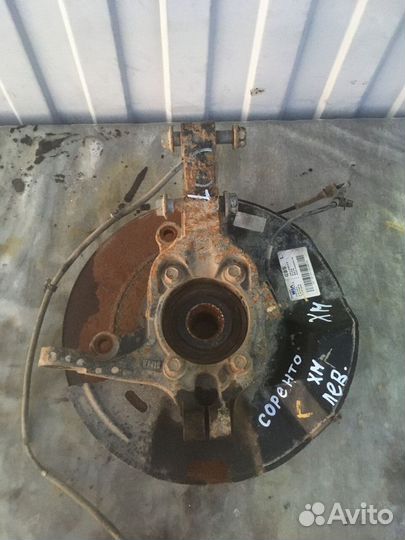 Передний левый поворотный кулак Кия Соренто 2 XM