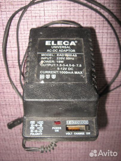 Блок питания eleka universal AC-DC adaptor 1,5-12V
