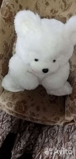 Большой плюшевый медведь