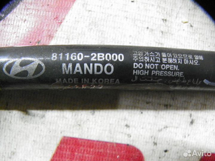 Амортизатор капота Kia Sportage