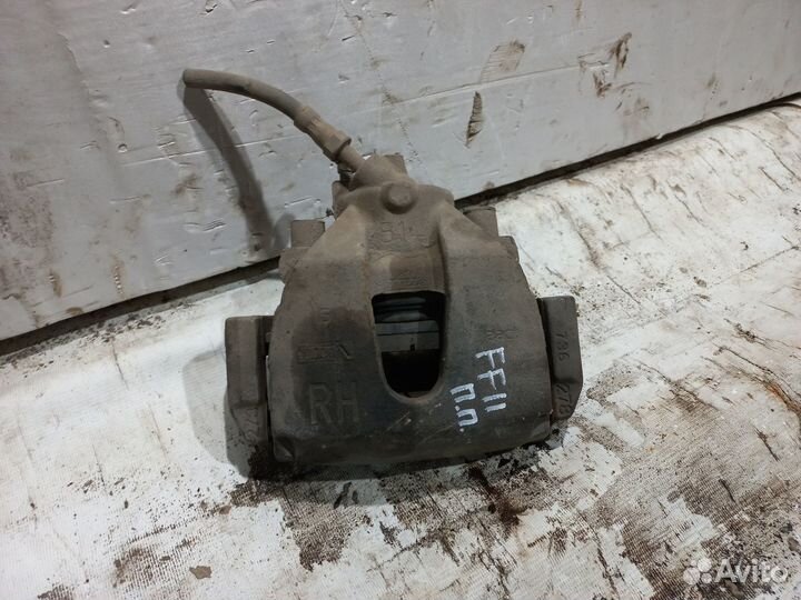 Передний правый суппорт Ford Focus 2