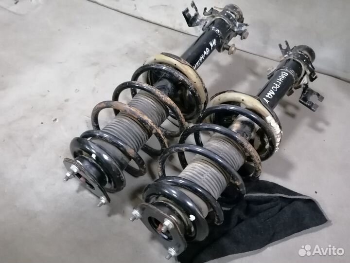 Амортизатор передний в сборе Nissan Wingroad Y11