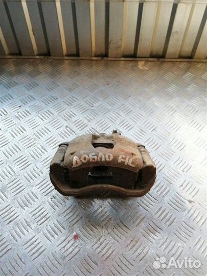 Суппорт тормозной передний левый Fiat Doblo 223