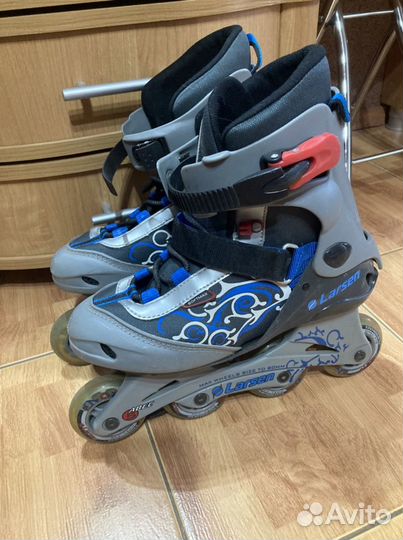 Роликовые коньки