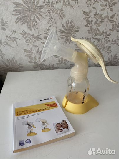 Молокоотсос medela ручной