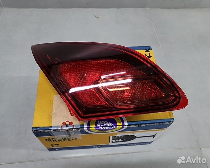 Фонарь в крышку левый Opel Astra J 2009-2017