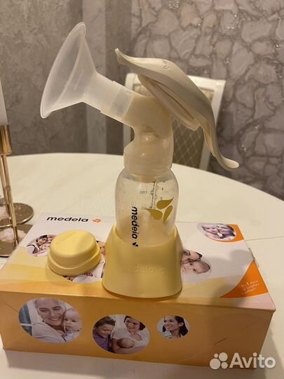 Молокоотсос medela ручной