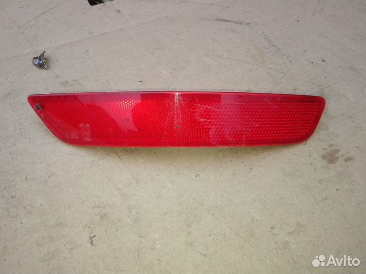 Светоотражатель заднего бампера правый Geely Atlas