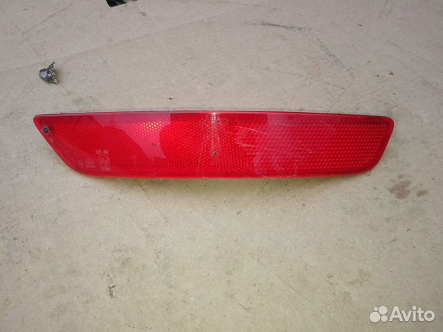 Светоотражатель заднего бампера правый Geely Atlas