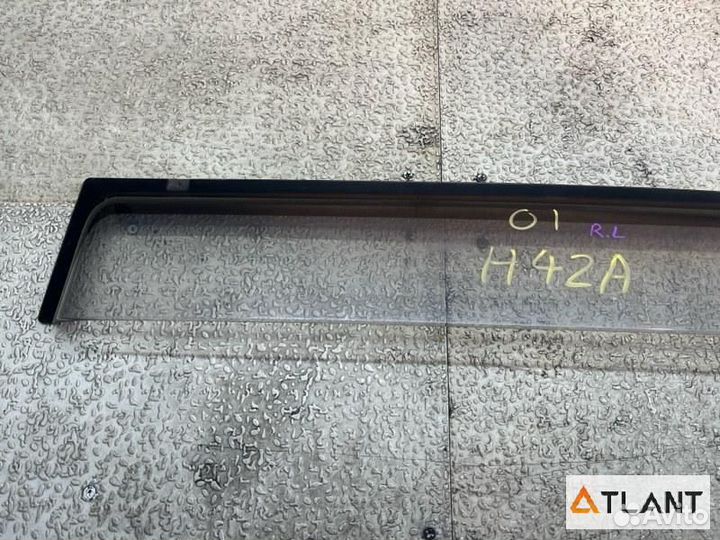 Ветровик задний левый mitsubishi toppo BJ