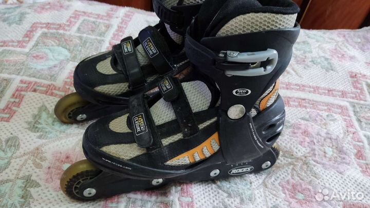 Роликовые коньки