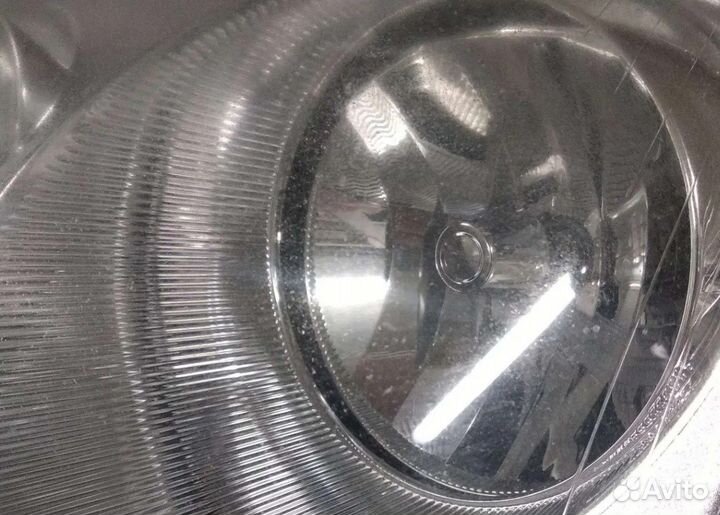 Фара левая VW Caddy 2005