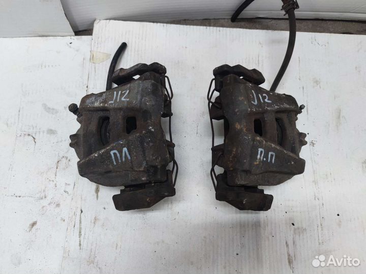 Суппорт тормозной передний Volkswagen tiguan 1