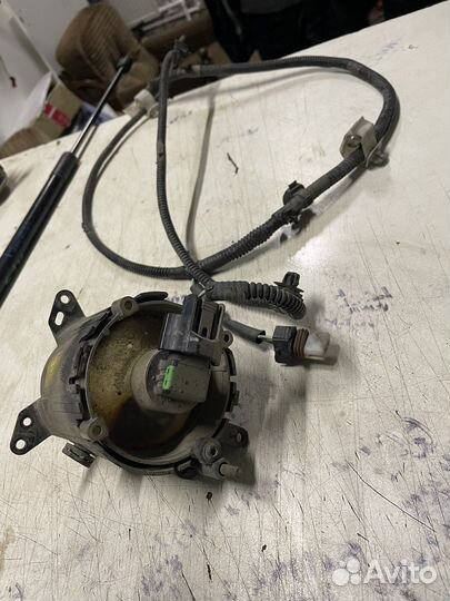 Фара противотуманная левая Mitsubishi Lancer 10