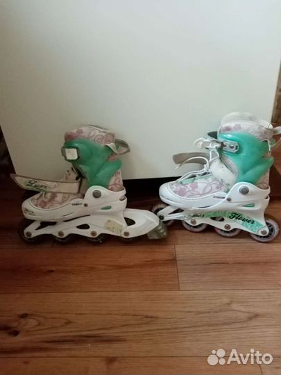 Роликовые коньки