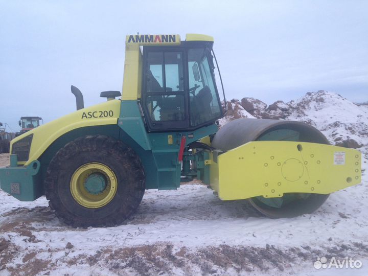 Машинист катка