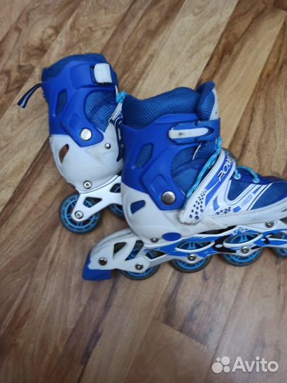 Роликовые коньки