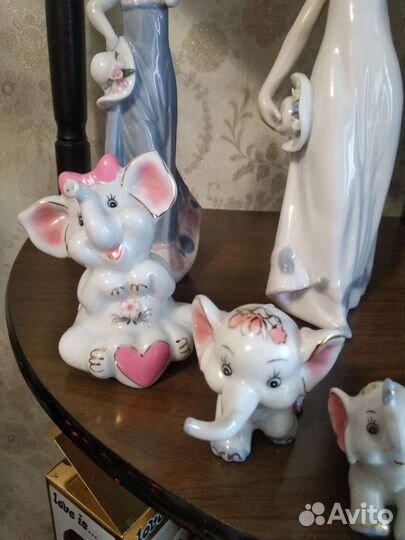 Фарфоровые статуэтки девочки, и слоники