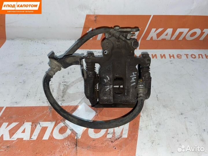 Суппорт тормозной задний левый Honda Accord