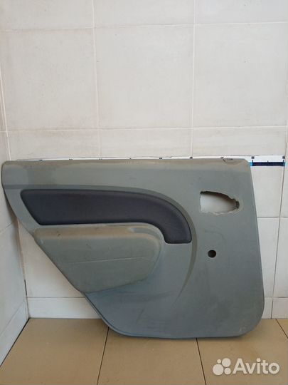 Обшивка двери задней левой Logan 2005-2014
