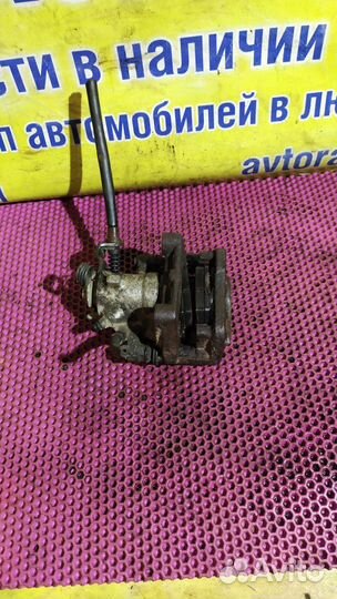 Суппорт тормозной задний правый Opel Astra