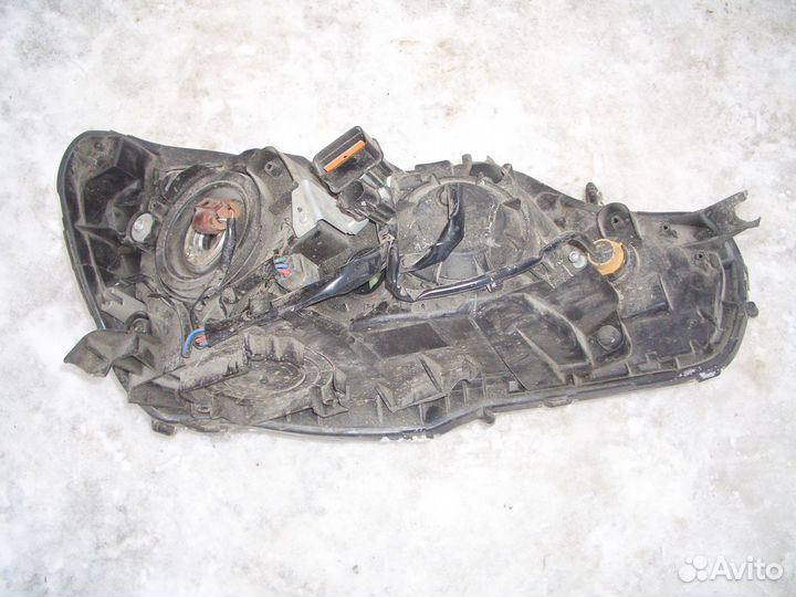 Фара левая Митсубиси Ланцер 10 с07-17г