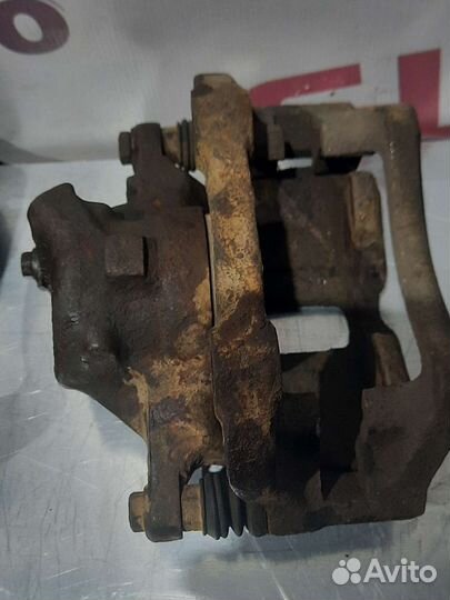 Суппорт тормозной VW Golf 3