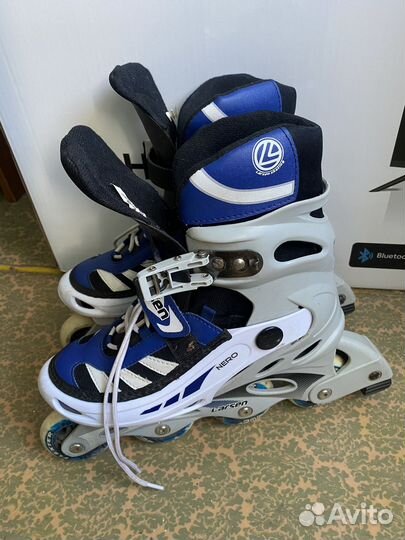 Роликовые коньки