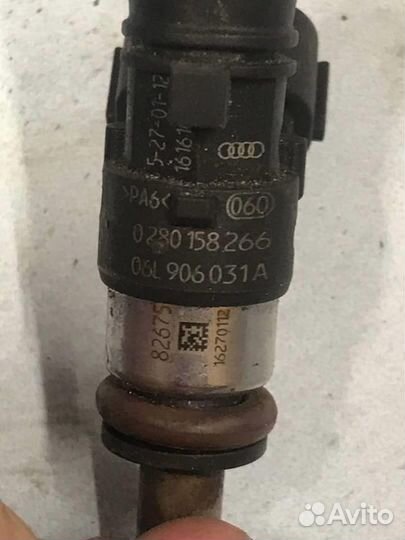 Форсунка топливная бензиновая 06L906031A