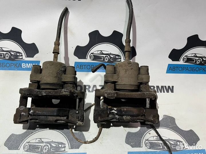 Суппорт тормозной задний левый правый BMW 5-серия