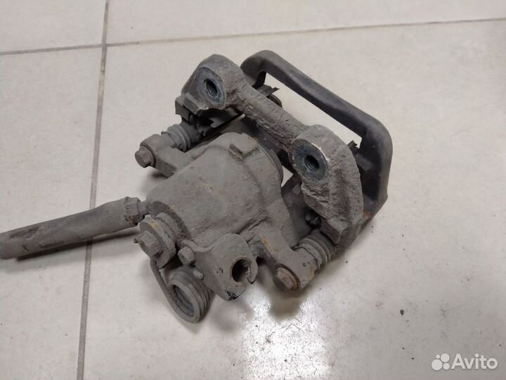 Суппорт тормозной задний правый Ford Explorer 5