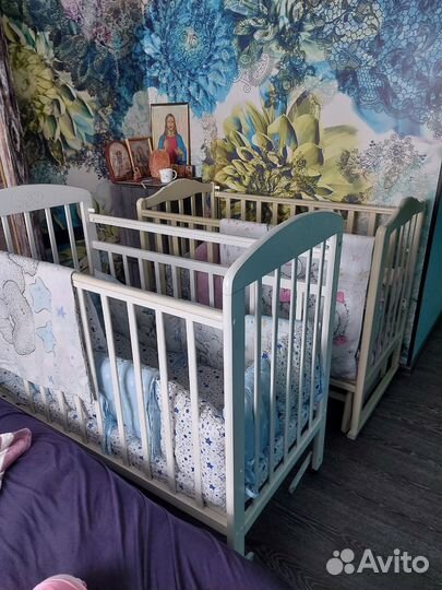 Детская кроватка с маятником